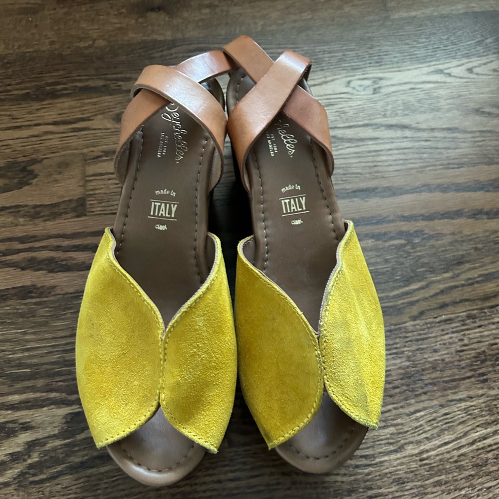 Cute yellow suede wedges with leather straps.
